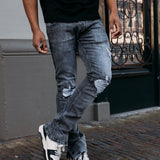 DISTRESSED FLARED JEANS
