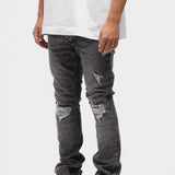 DISTRESSED FLARED JEANS