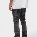 DISTRESSED FLARED JEANS