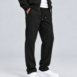 Core Tech Pants Black - zijkant studio