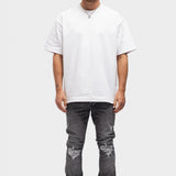 DISTRESSED FLARED JEANS