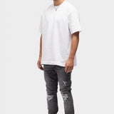 DISTRESSED FLARED JEANS