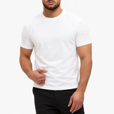 Classic Cotton T-shirt white — studio pose, zwarte pantalon