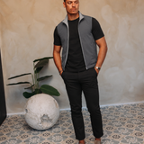 CORE BODYWARMER GREY met passend Gloss-shirt en zwarte broek – lifestyle 1