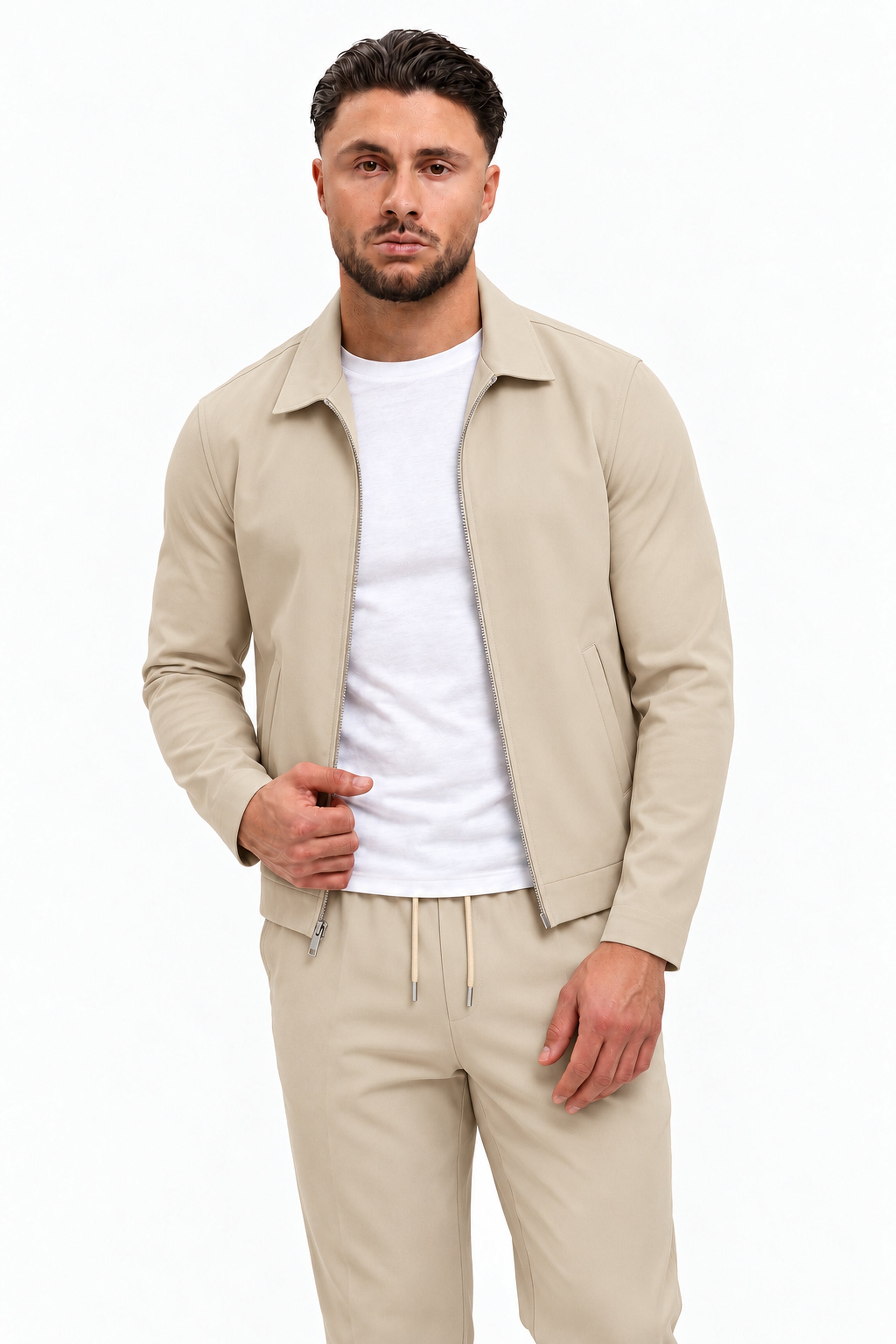 TECH SUIT BEIGE - studio pose